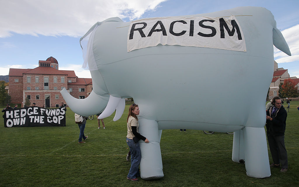 Activists Demonstrate Outside Of The Republican Presidential Debate In Boulder